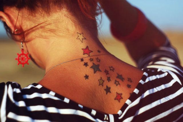17 colorful stars back and neck tattoo