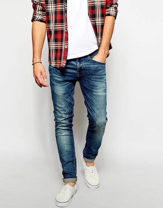 light summer jeans, a white tee, a checked shirt and white sneakers
