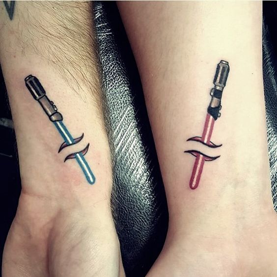 lightsaber couple tattoos