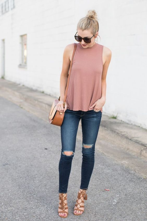 ripped jeans, a pink top, tan heels