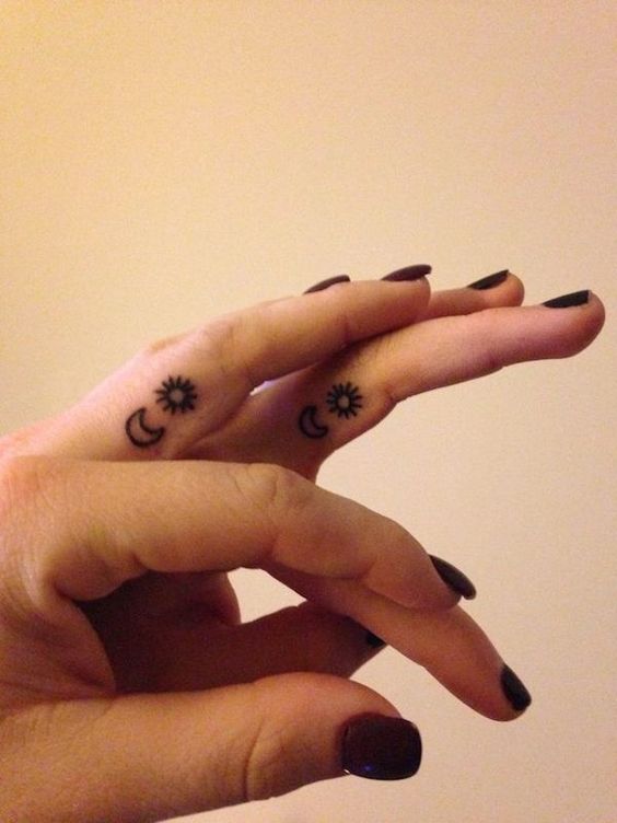 sun and moon finger tattoos