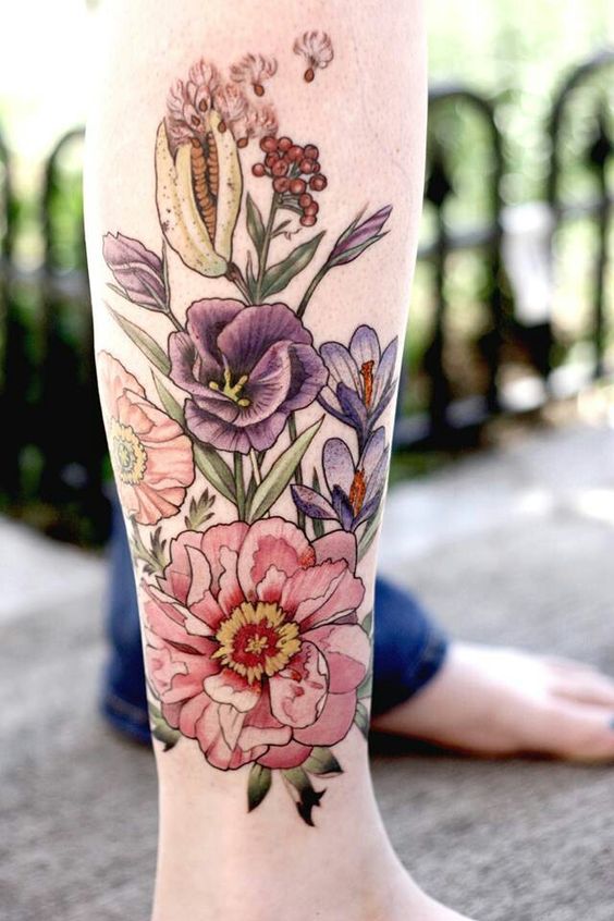 bold flower leg tattoo