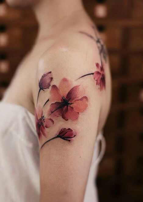 bold shoulder floral tattoo
