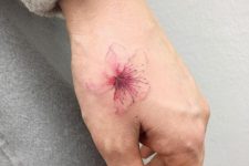 21 cherry blossom hand tattoo