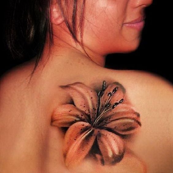 blackwork lily bloom on the back