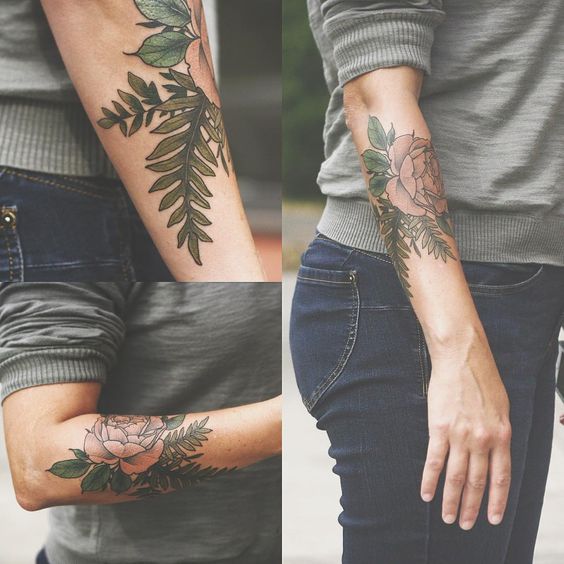 flower and leaf arm tattoo