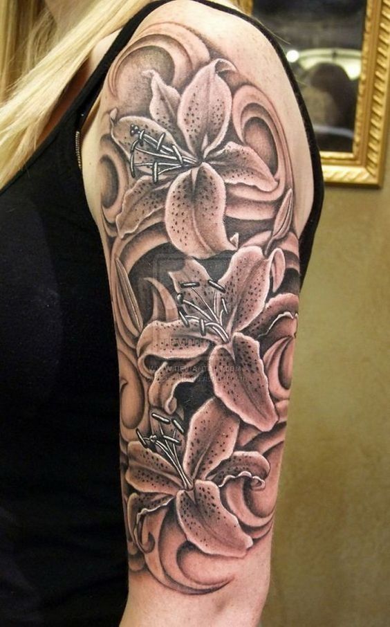 blackwork lily bloom tattoo sleeve