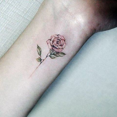 tiny rose wrist tattoo