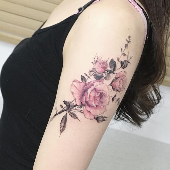rose arm tattoo