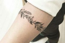 31 floral armband tattoo