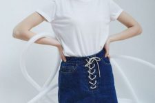 Classic look with denim lace up skirt with fringe hem
