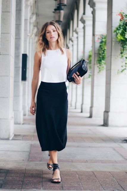 Elegant look with black skirt white shirt and flat sandals