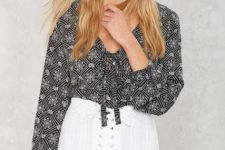 Look with printed blouse and white girlish skirt