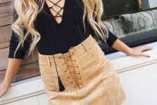 Look with suede skirt and lace up shirt