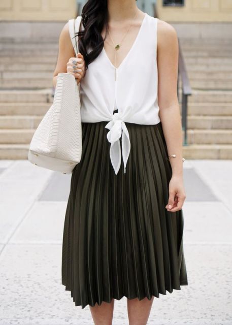 Pleated skirt and unique white shirt