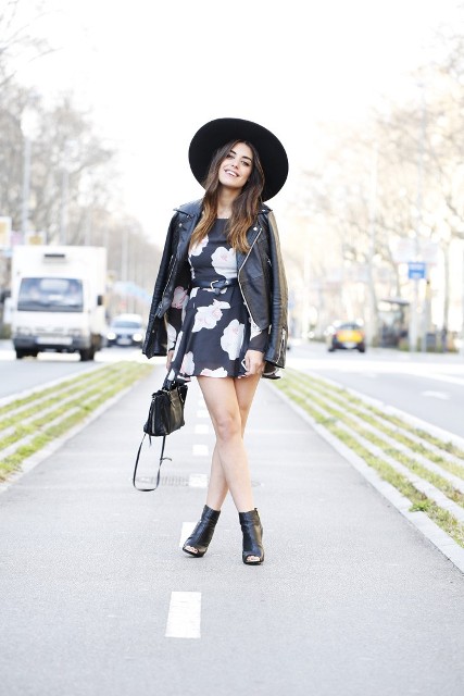 Trendy look with skater dress, boots and leather jacket