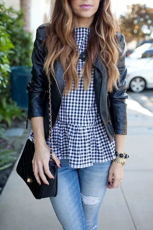 With leather jacket, mini bag and jeans