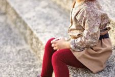 02 a brown floral shirt, a brown skirt, red leggings, brown boots