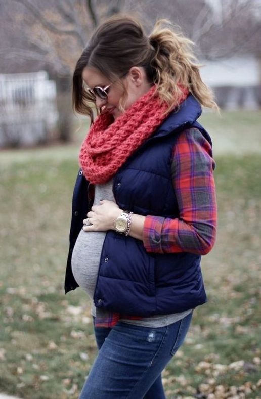 a flannel shirt, a puffer vest and chunky knit scarf