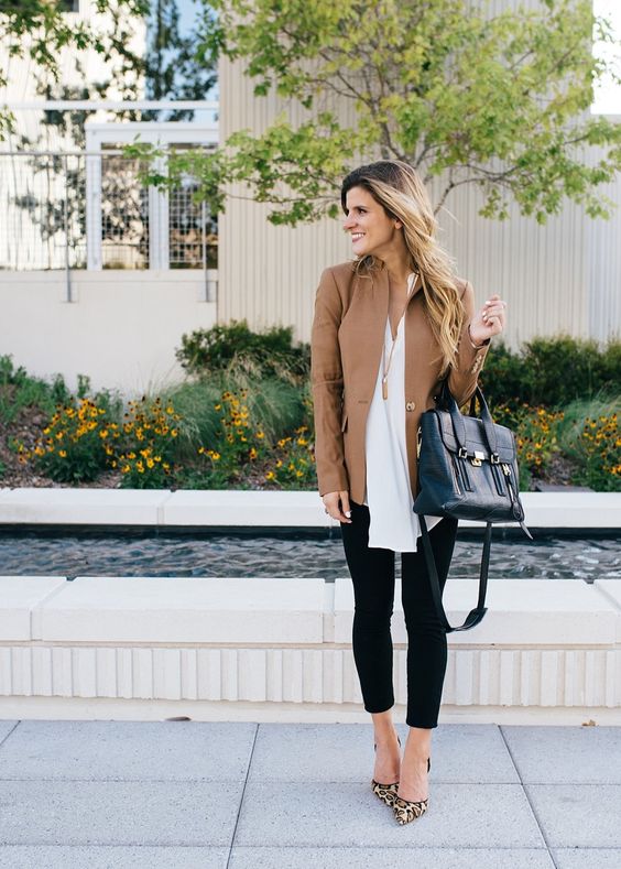 black cropped jeans, a white shirt, a tan jacket and leopard shoes