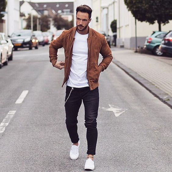black jeans, a classic white t-shirt, a brown suede jacket and white chucks