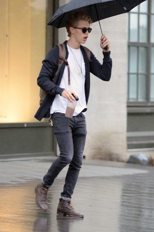 black jeans, a white tee, a black cardigan and brown boots