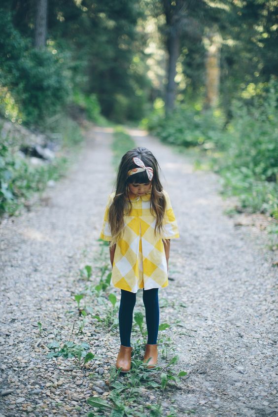 checked yellow dress, green leggings, brown boots