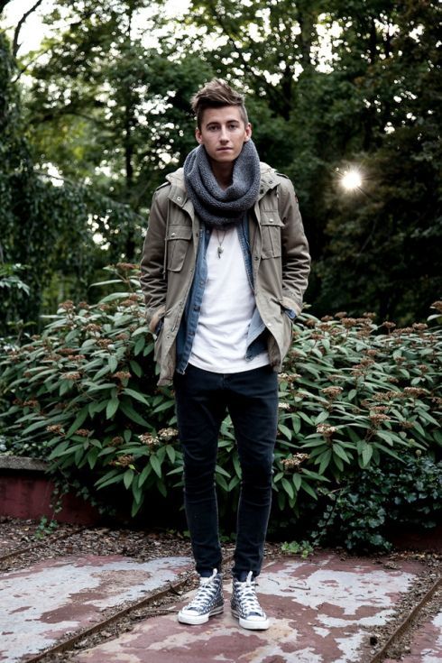 black jeans, a white tee, a denim overshirt, a grey jacket and a grey scarf
