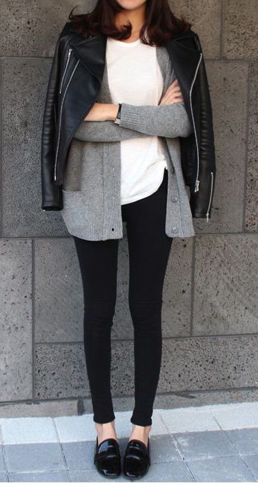 black leggings, a white tee, a grey cardigan and a black leather jacket