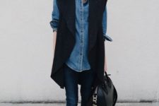 13 navy jeans, a denim shirt, a black sleeveless coat and cat loafers