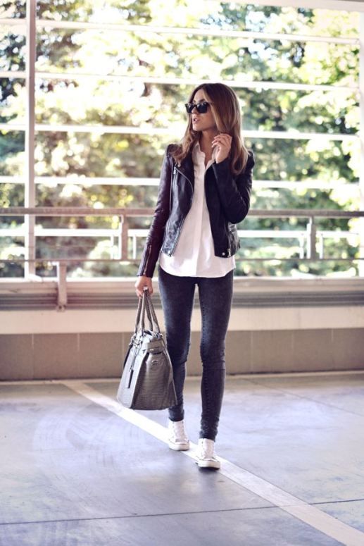 grey jeans, a white shirt and a black leather jacket