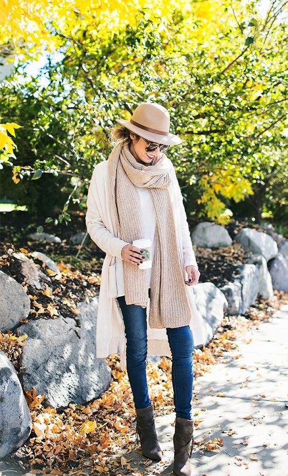 a neutral look with a white cardigan and a nude scarf