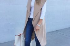 18 sleeveless camel coat, blue jeans, a white long sleeve and dotted flats