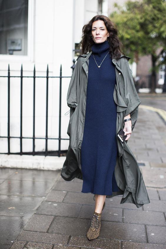 sweater dress, an olive green trench coat and animal-printed ankle boots