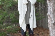 18 white chunky sweater cardigan, an olive green shirt and high boots