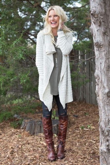 white chunky sweater cardigan, an olive green shirt and high boots