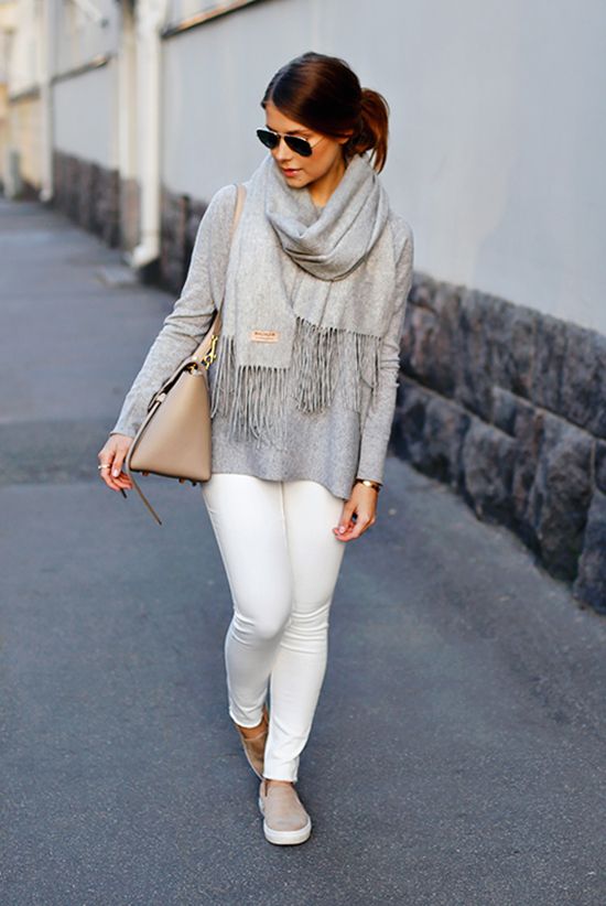 white jeans, a grey sweater, a grey blanket scarf and nude loafers