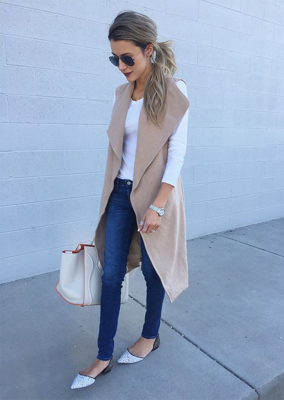 sleeveless camel coat, white long tee, spotted flats and jeans