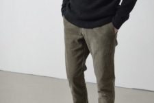 23 olive grey trousers, a black sweater and brown boots