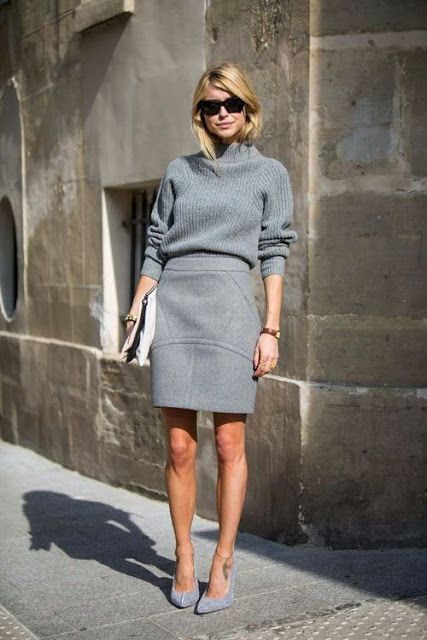 monochrome grey look with a skirt and a turtleneck sweater and heels