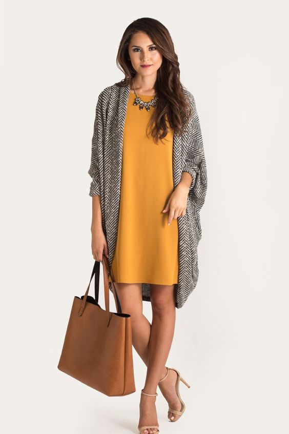 mustard dress, a chevron coat, a statement necklace and nude heels