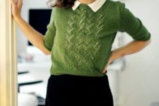 30 preppy look with a green sweater and a white shirt, a black mini skirt
