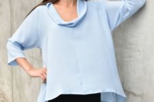 Loose light blue blouse with skinny pants