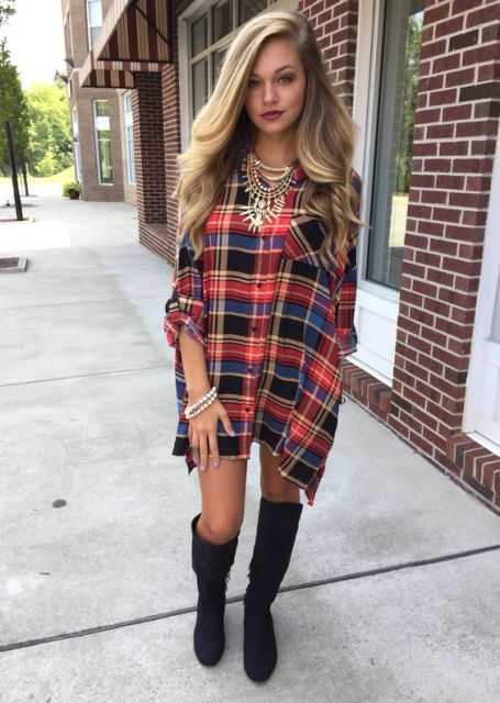 Loose mini dress with statement necklace and high boots