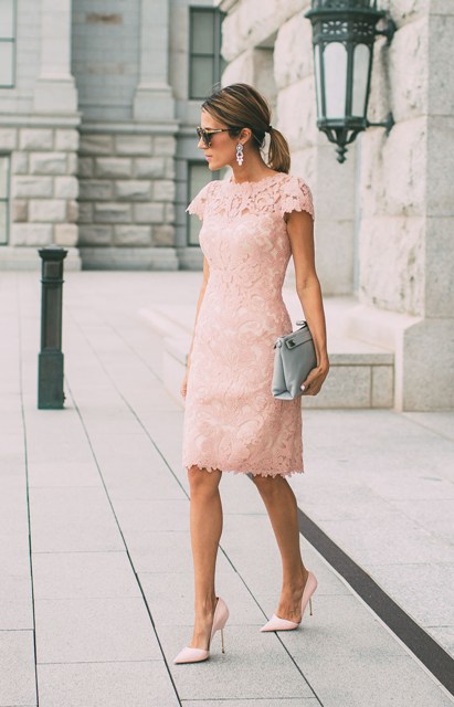 Outfit with lace dress, stylish pumps and clutch