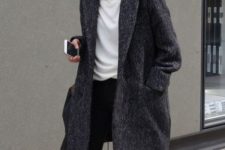 Oversized coat with simple white shirt and black trousers