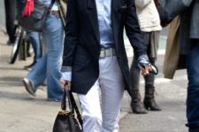 With blue shirt, white pants and pumps