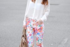 With classic white blouse and floral pants