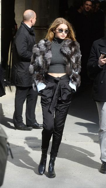 With crop top, fur jacket an boots