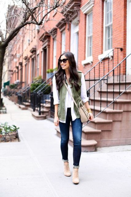 With cuffed skinny jeans, white blouse and neutral heels